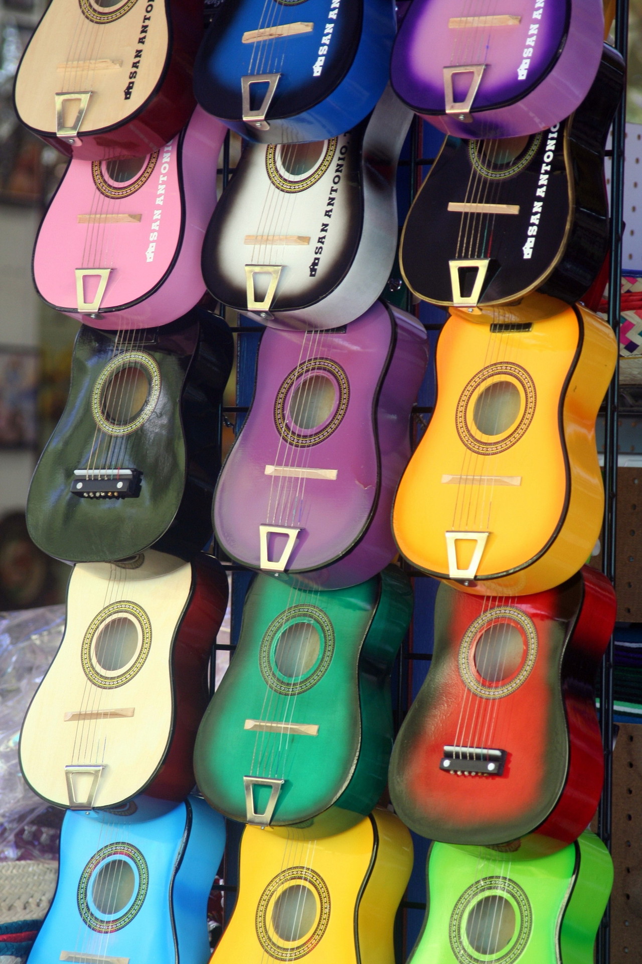 small-colored-guitars-in-san-antonio-mexican-neighboirhood-1412554-1280x1920